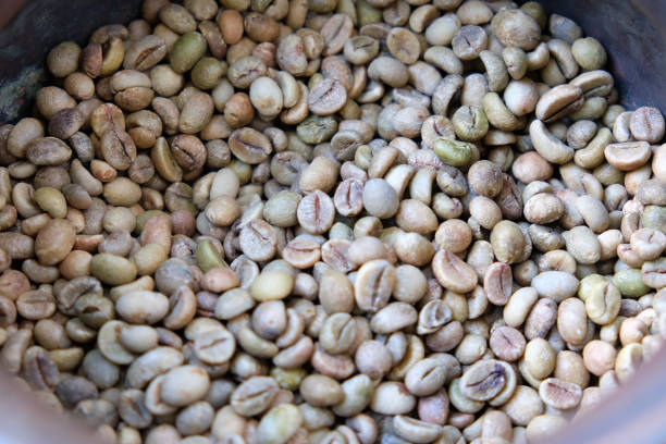 istock Fresh coffee beans in a pot 1184029976