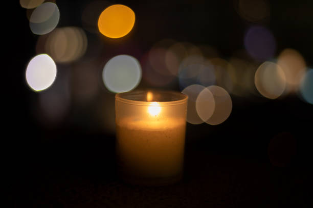 istock Candle alone with a great bokeh at night 1184030732