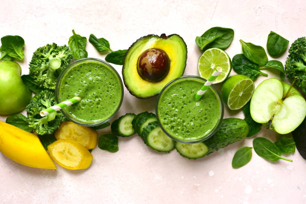 istock Green vegetable detox smoothie with ingredients for making 1184032664