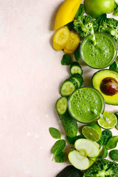 istock Green vegetable detox smoothie with ingredients for making 1184032666