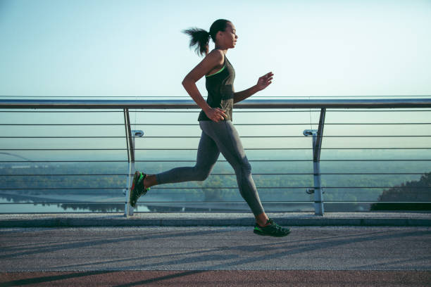 istock Keeping fit while running outdoors stock photo 1184032735