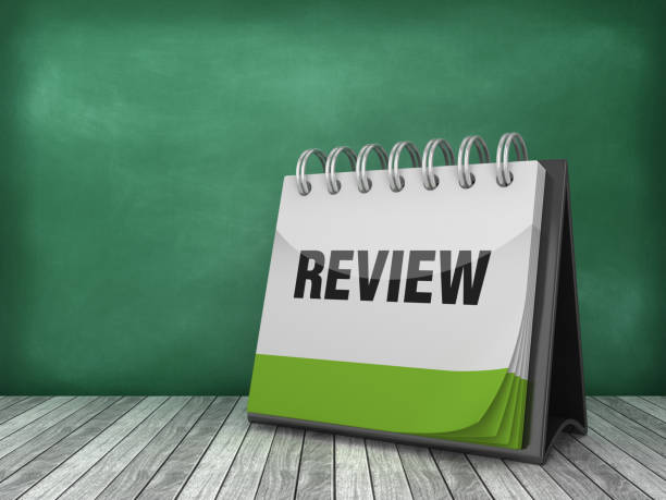 istock REVIEW Calendar on Chalkboard Background - 3D Rendering 1184033659