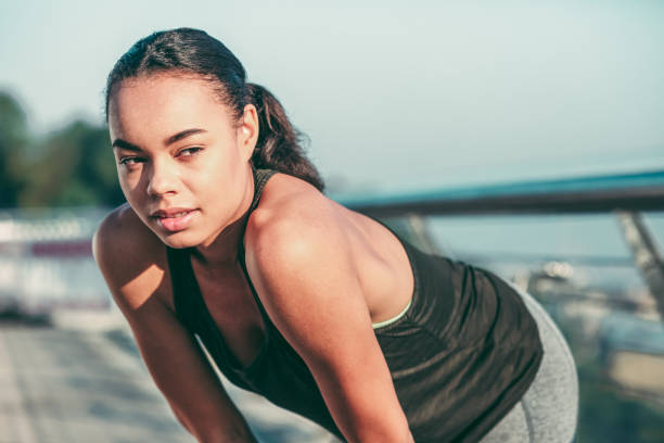 istock Bending back down while relaxing during the training stock photo 1184033786