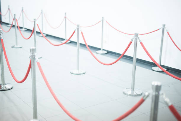 istock Mobile fence barrier with red belt 1184036172