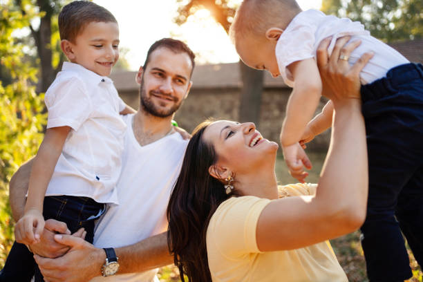 istock Family in autumn park 1184036621