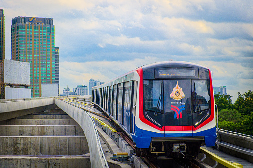 Bangkok-Thailand AUG 9 2019: BTS Sky Train on cityscape backgroundin daytime , Sky Train is a mass transit system in Bangkok to assist facilitate and fast journey