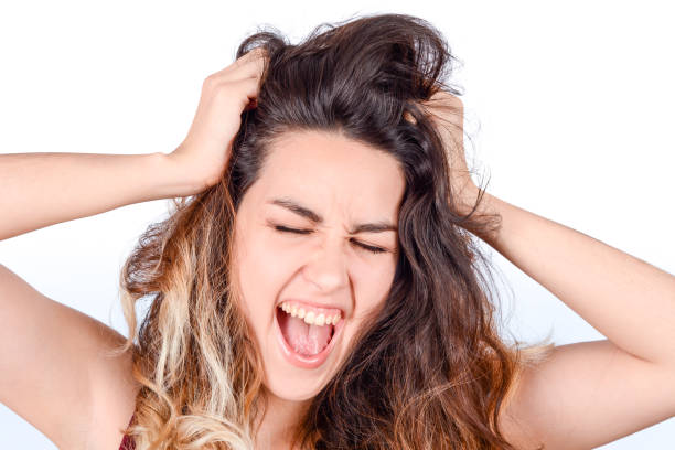 istock Young woman laughing. 1184041654