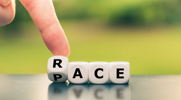 istock Hand turns a dice and changes the word 