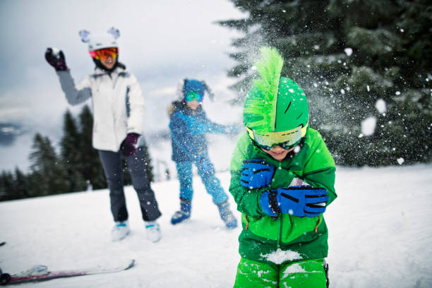 istock Skiing family having fun on winter day 1184043073