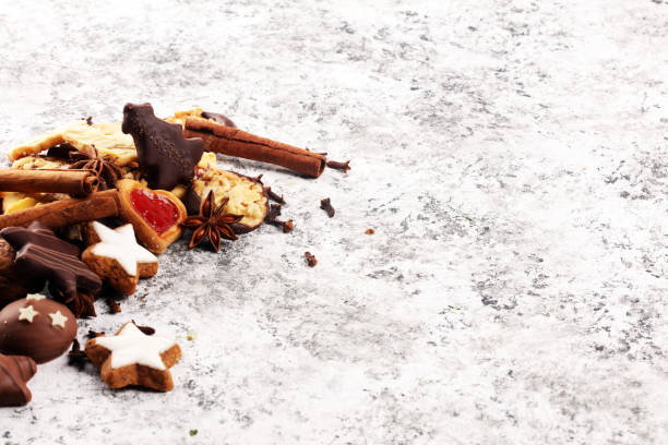 istock christmas cookies with spieses, nuts and fruits on rustic table 1184043583