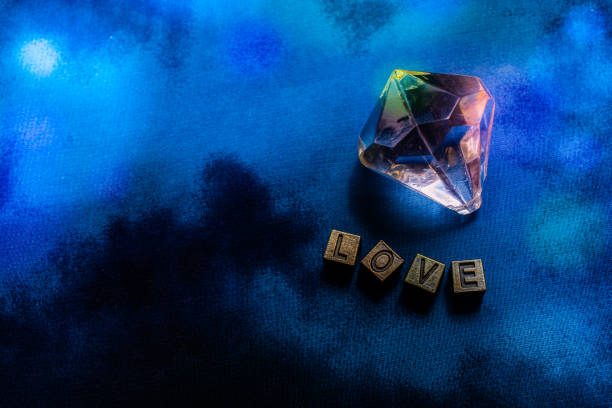 istock Ornamental key and fake diamond beside love wording 1184046855