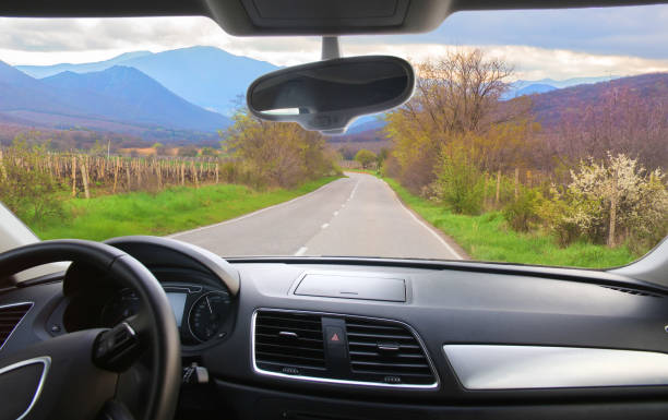 istock car going on the mountain road 1184048494