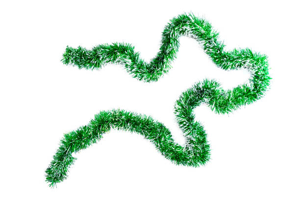 istock Christmas green tinsel for decoration. Garland for the Christmas tree. White Isolate 1184050943
