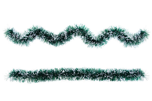 christmas green tinsel for decoration.isolate - tinsel imagens e fotografias de stock