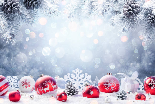 istock Christmas - Red Ornament On Snow With Fir Branches 1184055064