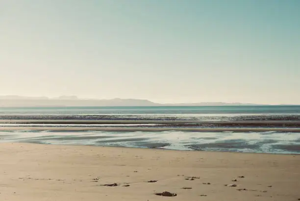 The Wintery Blues of a Seascape Background at Lowtide