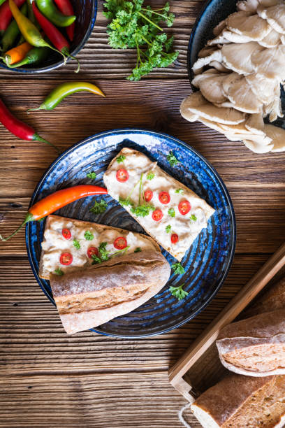 istock Oyster mushroom spread with Camembert cheese and herbs 1184058920