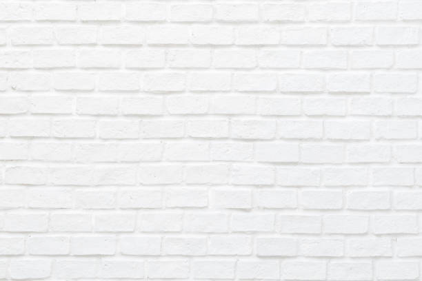 istock White brick wall texture background with stained old stucco light gray and aged painted cement block for room interior rustic vintage wallpaper decoration 1184062185
