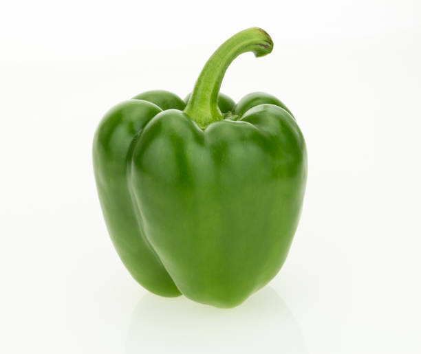istock Fresh green bell pepper, isolated on white background. 1184062550