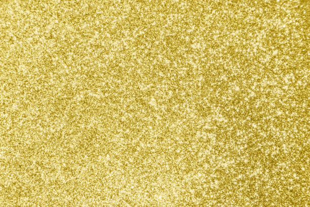 istock Abstract gold glitter sparkle bokeh light background 1184062711