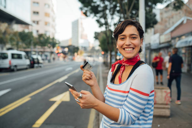 istock Young woman checking her bank account 1184062861