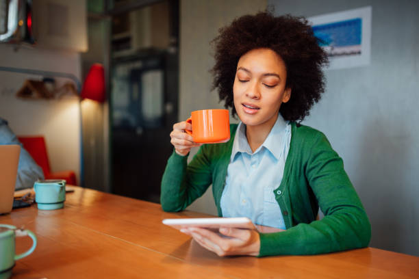 istock African American female student browsing on her tablet computer 1184062873