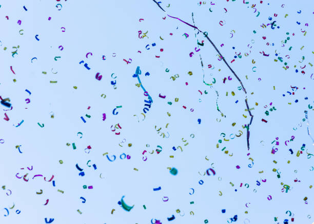 istock Festive  canfetti falling from the blue sky 1184063256