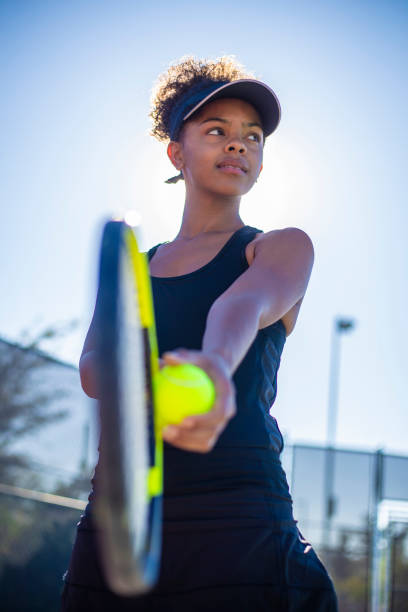 Tennis player A young woman playing tennis tennis tournament stock pictures, royalty-free photos & images