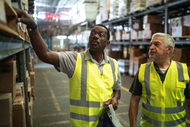 istock Partners or coworker working at warehouse 1184067409