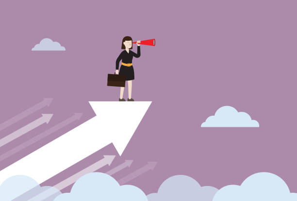 istock Businesswoman with a telescope standing on an arrow 1184072502
