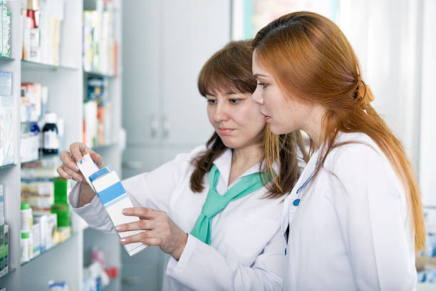 istock pharmacy. woman chemist at work. 118407488