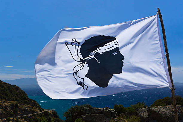 Background image of French National Flag flying in breeze against changing sky - white and storm clouds and blue sky