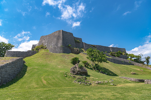 Uruma, Okinawa, Japan - April 6 2019 : Scenery of the Katsuren Castle Ruins. It was designated a UNESCO World Heritage Site in 2000 as part of one of the nine Gusuku Sites and Related Properties of the Kingdom of Ryukyu.