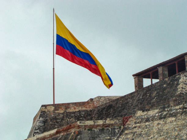 istock Colombian flag waving in the wind 1184089422