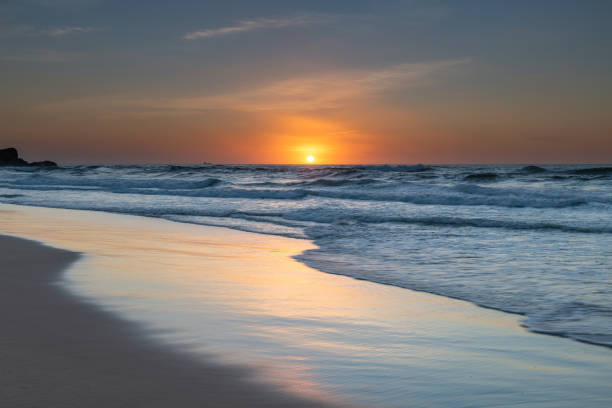 istock Light High Cloud Beach Sunrise Seascape 1184089617