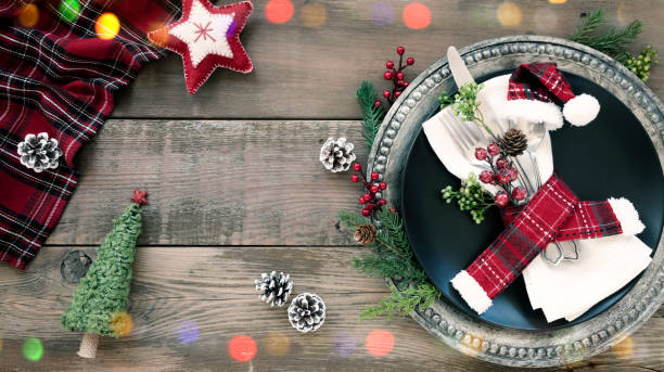 istock Holiday Christmas Dining Plate on an Old Wood Table 1184089631