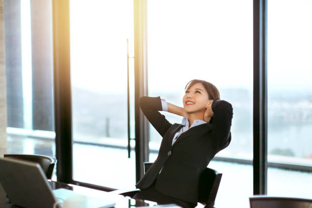 istock young business woman working in office 1184089716