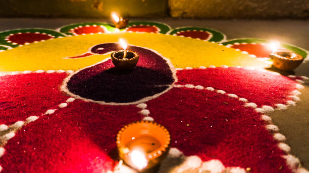 istock Rangoli with Diya made in Diwali decoration 1184091619
