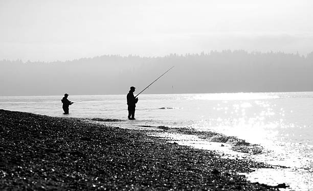 Fisherman on a sunny day stock photo