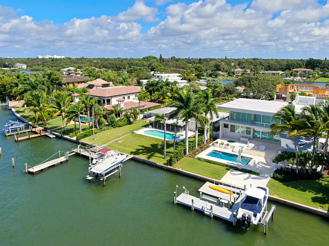 Aerial view of luxury villas and the private boat in Bay Island neighborhood, Sarasota, Florida, USA