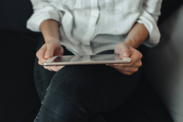 istock A picture of a young woman working on a tablet computer 1184109747
