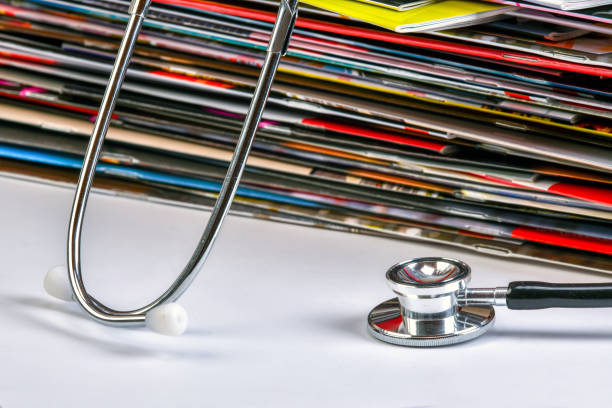 istock Magaziness and stethoscope. 1184111846