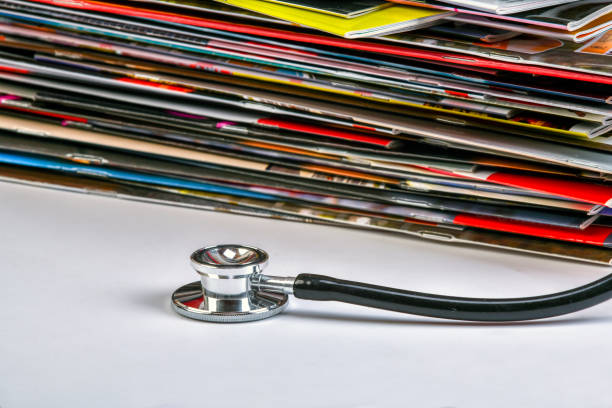 istock Magaziness and stethoscope. 1184112276