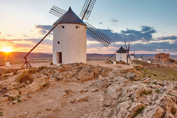 istock Traditional antique windmills at sunset in Spain. Consuegra, Toledo 1184118877