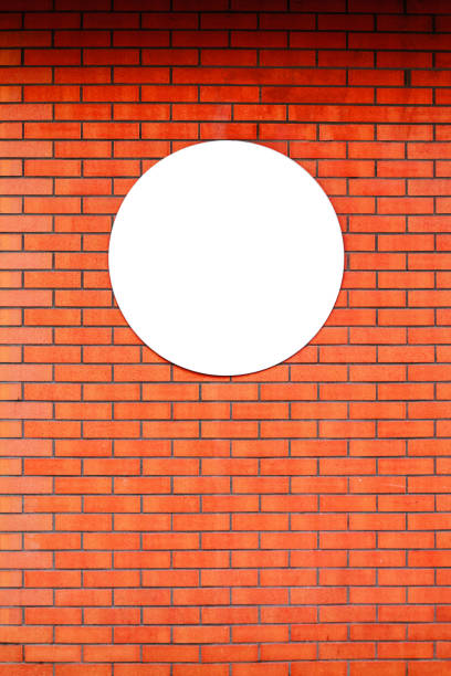 istock Signboard store layout logo design circle template on red brick wall. 1184120617