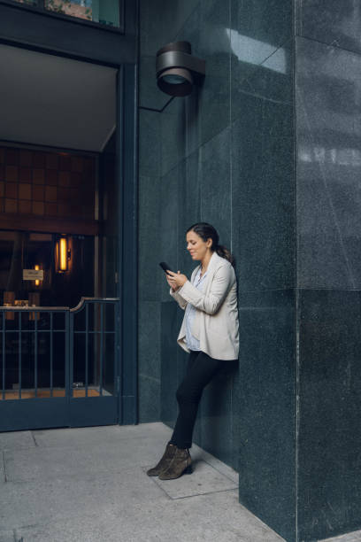 istock Pregnant woman working at the office 1184121320