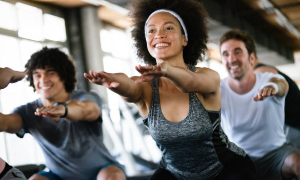 istock Team workout in gym to reach goals 1184122954