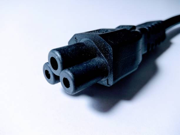 istock Laptop charger pin on white background 1184133999