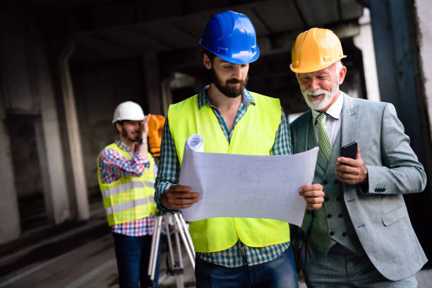 istock Picture of construction engineer working on building site 1184134360