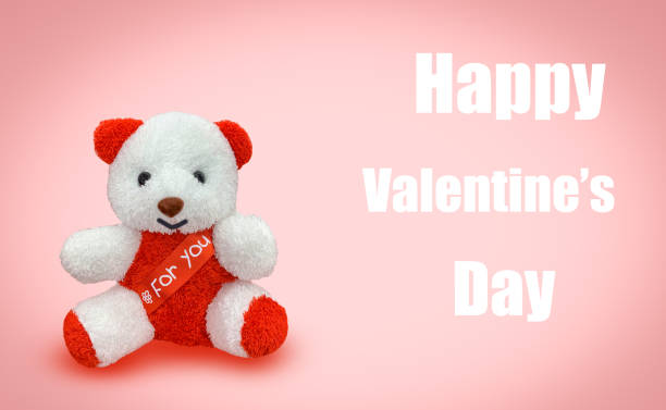istock Bear doll sitting with pink background 1184135305